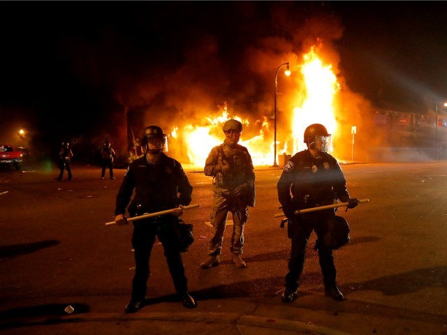 Click image for larger version

Name:	Police-guard-against-protesters-fire-background-Minneapolis-George-Floyd-riot-ap-640x480.jpg
Views:	47
Size:	56.7 KB
ID:	498977